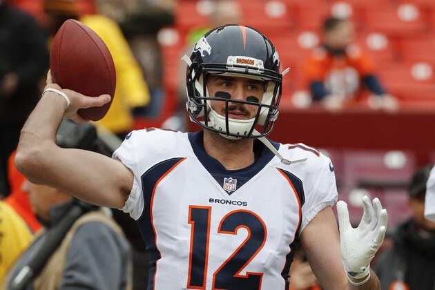 Denver Broncos quarterback Paxton Lynch (12) warms up before an NFL football game against the Washington Redskins in Landover, Md., Sunday, Dec 24, 2017. (AP Photo/Alex Brandon)