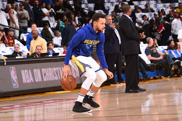 OAKLAND, CA - DECEMBER 25:   Stephen Curry #30 of the Golden State Warriors warms up before the game against the Cleveland Cavaliers on December 25, 2017 at ORACLE Arena in Oakland, California. NOTE TO USER: User expressly acknowledges and agrees that, by downloading and or using this photograph, user is consenting to the terms and conditions of Getty Images License Agreement. Mandatory Copyright Notice: Copyright 2017 NBAE (Photo by Noah Graham/NBAE via Getty Images)
