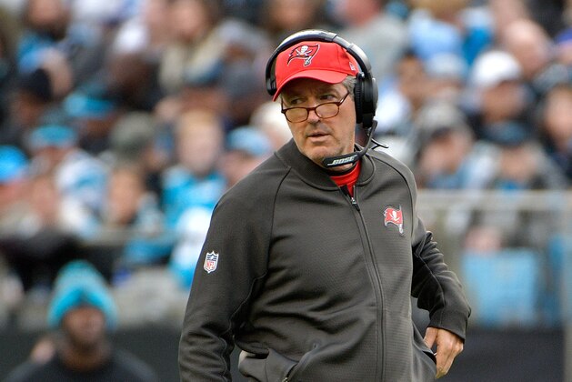 CHARLOTTE, NC - DECEMBER 24:  Head coach Dirk Koetter of the Tampa Bay Buccaneers reacts between plays against the Carolina Panthers during their game at Bank of America Stadium on December 24, 2017 in Charlotte, North Carolina.  (Photo by Grant Halverson/Getty Images)
