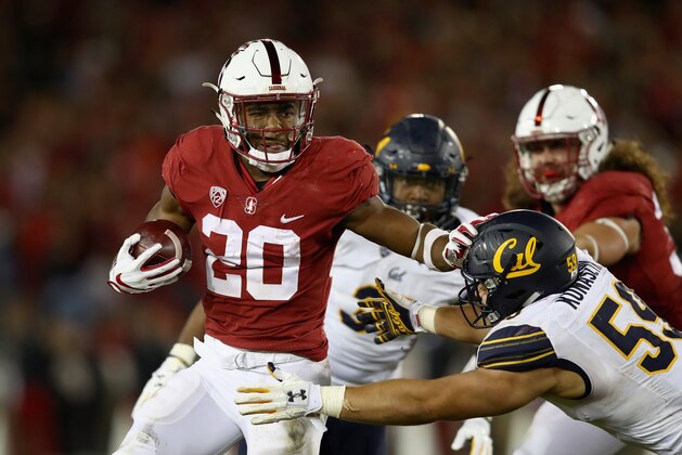 PALO ALTO, CA - NOVEMBER 18:  Bryce Love #20 of the Stanford Cardinal in action against the California Golden Bears at Stanford Stadium on November 18, 2017 in Palo Alto, California.  (Photo by Ezra Shaw/Getty Images)