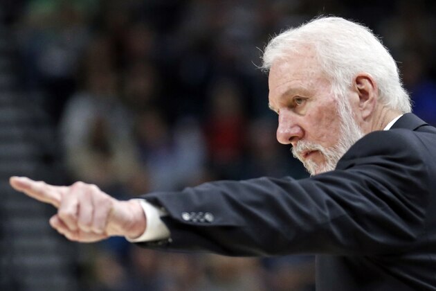 San Antonio Spurs coach Gregg Popovich gestures during the first half of the team's NBA basketball game against the Utah Jazz on Thursday, Dec. 21, 2017, in Salt Lake City. (AP Photo/Rick Bowmer)