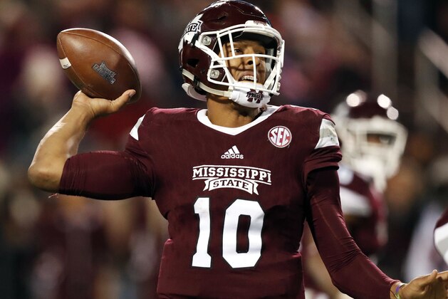 Mississippi State quarterback Keytaon Thompson throws a pass against Mississippi during the second half of their NCAA college football game in Starkville, Miss., Thursday, Nov. 23, 2017. Mississippi won 31-28. (AP Photo/Rogelio V. Solis)