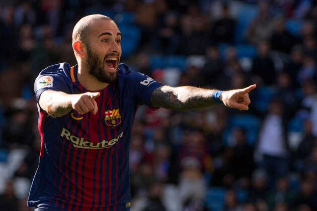Barcelona's Spanish midfielder Aleix Vidal celebrates after scoring during the Spanish League 'Clasico' football match Real Madrid CF vs FC Barcelona at the Santiago Bernabeu stadium in Madrid on December 23, 2017.  / AFP PHOTO / CURTO DE LA TORRE        (Photo credit should read CURTO DE LA TORRE/AFP/Getty Images)