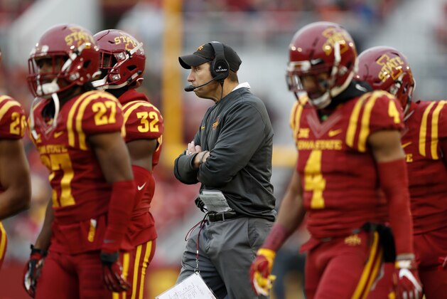Iowa State head coach Matt Campbell, center, watches from the sideline during the first half of an NCAA college football game against Oklahoma State, Saturday, Nov. 11, 2017, in Ames, Iowa. (AP Photo/Charlie Neibergall)