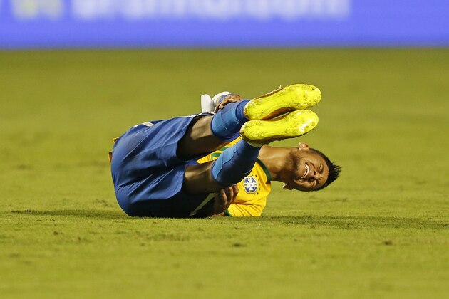 MIAMI GARDENS, FL - SEPTEMBER 5: Neymar #10 of Brazil reacts after hitting the pitch after falling over Carlos Valdes #23 (not pictured) of Columbia during a friendly match on September 5, 2014 at Sun Life Stadium Stadium in Miami Gardens, Florida. Brazil defeated Columbia 1-0. (Photo by Joel Auerbach/Getty Images)