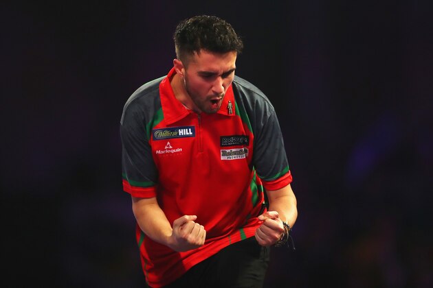 LONDON, ENGLAND - DECEMBER 27:  Jamie Lewis of Wales celebrates winning the second set of his second round match against Peter Wright of England on day eleven of the 2018 William Hill PDC World Darts Championships at Alexandra Palace on December 27, 2017 in London, England.  (Photo by Naomi Baker/Getty Images)