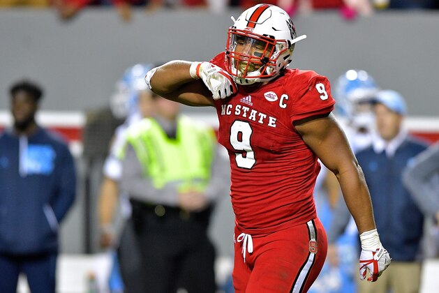 RALEIGH, NC - NOVEMBER 25:  Bradley Chubb #9 of the North Carolina State Wolfpack reacts after a win against the North Carolina Tar Heels during their game at Carter Finley Stadium on November 25, 2017 in Raleigh, North Carolina. North Carolina State won 33-21.  (Photo by Grant Halverson/Getty Images)
