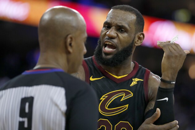 Cleveland Cavaliers forward LeBron James (23) argues with referee Derrick Stafford (9) during the second half against the Golden State Warriors of an NBA basketball game in Oakland, Calif., Monday, Dec. 25, 2017. The Warriors won 99-92. (AP Photo/Tony Avelar)