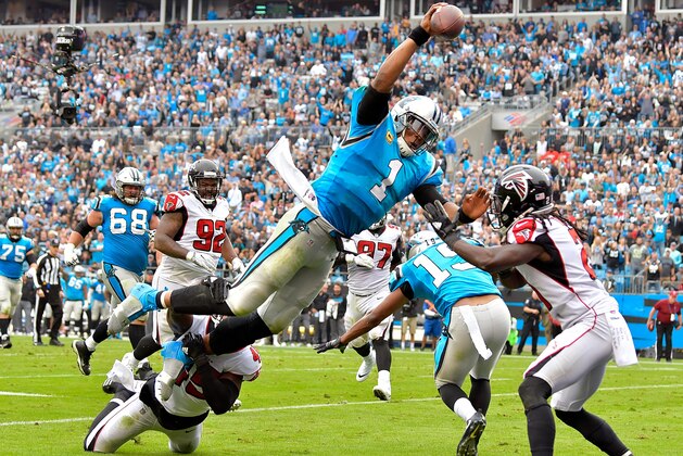 CHARLOTTE, NC - NOVEMBER 05:  Cam Newton #1 of the Carolina Panthers dives into the end zone for a touchdown during the second quarter of their game against the Atlanta Falcons at Bank of America Stadium on November 5, 2017 in Charlotte, North Carolina.  (Photo by Grant Halverson/Getty Images)