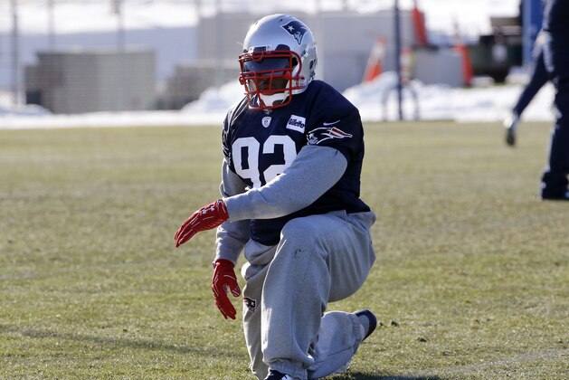 New England Patriots linebacker James Harrison stretches during an NFL football team practice Wednesday, Dec. 27, 2017, in Foxborough, Mass. The Patriots signed the 39-year-old, five-time Pro Bowl linebacker after he was released Saturday by the Pittsburgh Steelers. (AP Photo/Bill Sikes)