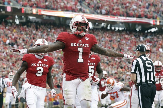 North Carolina State's Jaylen Samuels (1) celebrates his touchdown against Clemson during the first half of an NCAA college football game in Raleigh, N.C., Saturday, Nov. 4, 2017. (AP Photo/Gerry Broome)