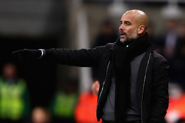 NEWCASTLE UPON TYNE, ENGLAND - DECEMBER 27:  Pep Guardiola, Manager of Manchester City points from the sideline during the Premier League match between Newcastle United and Manchester City at St. James Park on December 27, 2017 in Newcastle upon Tyne, England.  (Photo by Chris Brunskill Ltd/Getty Images)