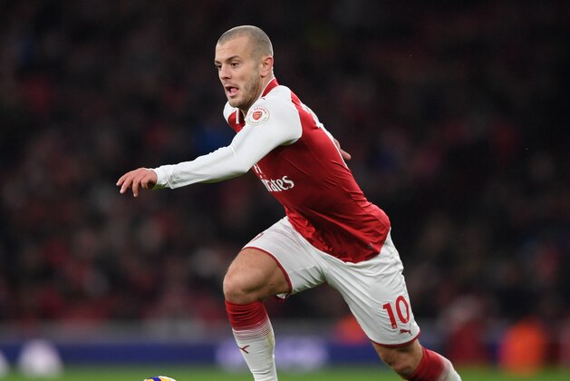 LONDON, ENGLAND - DECEMBER 16:  Jack Wilshere of Arsenal runs with the ball during the Premier League match between Arsenal and Newcastle United at Emirates Stadium on December 16, 2017 in London, England. (Photo by Shaun Botterill/Getty Images)