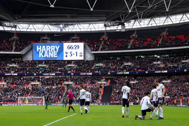 LONDON, ENGLAND - DECEMBER 26: General view as Harry Kane of Tottenham Hotspur celebrates after scoring his sides fifth goal with Heung-Min Son of Tottenham Hotspur during the Premier League match between Tottenham Hotspur and Southampton at Wembley Stadium on December 26, 2017 in London, England. (Photo by Catherine Ivill/Getty Images)