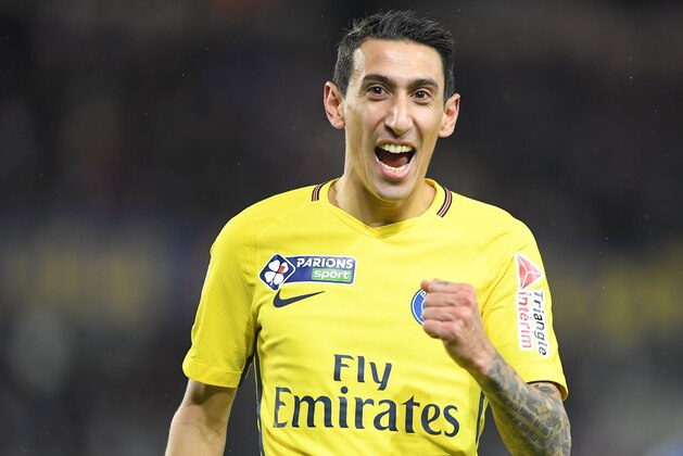 Paris Saint-Germain's Argentinian forward Angel Di Maria celebrates after scoring a goal during the French League Cup round of 16 football match between Strasbourg (RCSA) and Paris-Saint-Germain (PSG) on December 13, 2017 at the Meinau stadium in Strasbourg, eastern France. / AFP PHOTO / PATRICK HERTZOG        (Photo credit should read PATRICK HERTZOG/AFP/Getty Images)