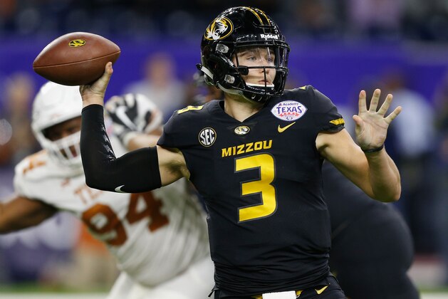 HOUSTON, TX - DECEMBER 27:  Drew Lock #3 of the Missouri Tigers looks for a receiver against the Texas Longhorns during the Academy Sports & Outdoors Bowl at NRG Stadium on December 27, 2017 in Houston, Texas.  (Photo by Bob Levey/Getty Images)