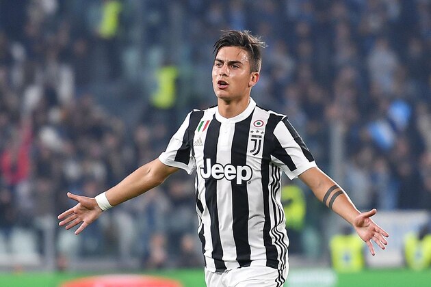 Juventus' Paulo Dybala celebrates after scoring during the Serie A soccer match between Juventus and Spal at the Allianz Stadium in Turin, Italy, Wednesday, Oct. 25, 2017. (Alessandro Di Marco/ANSA via AP)