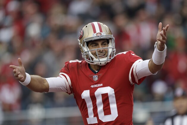 Jimmy Garoppolo, quarterback de los 49ers de San Francisco, festeja durante el encuentro ante los Jaguars de Jacksonville, el domingo 24 de diciembre de 2017 (AP Foto/Marcio José Sánchez)