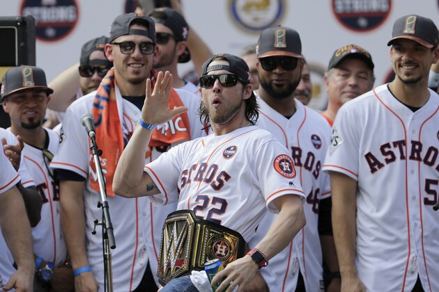 HOUSTON, TX - NOVEMBER 03:  Josh Reddick #22 of the Houston Astros is introduced during the Houston Astros Victory Parade on November 3, 2017 in Houston, Texas.  The Astros defeated the Los Angeles Dodgers 5-1 in Game 7 to win the 2017 World Series.  (Photo by Tim Warner/Getty Images)