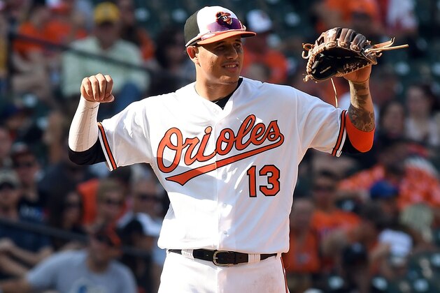 BALTIMORE, MD - SEPTEMBER 24:  Manny Machado #13 of the Baltimore Orioles plays third base against the Tampa Bay Rays at Oriole Park at Camden Yards on September 24, 2017 in Baltimore, Maryland.  (Photo by G Fiume/Getty Images)