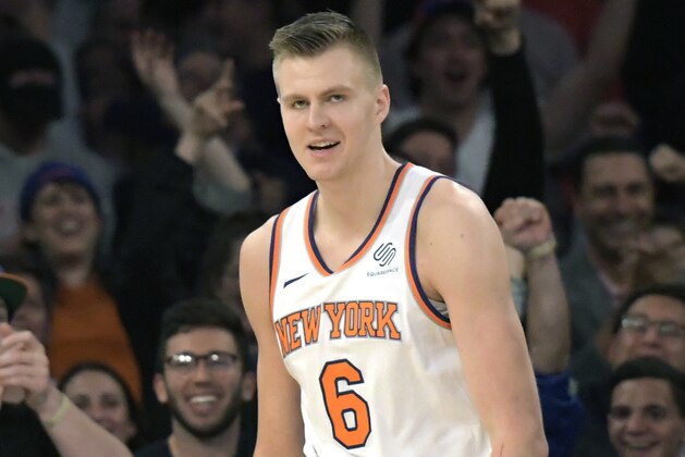 New York Knicks forward Kristaps Porzingis reacts after dunking the ball during the fourth quarter of an NBA basketball game against the Phoenix Suns, Friday, Nov. 3, 2017, at Madison Square Garden in New York. (AP Photo/Bill Kostroun)