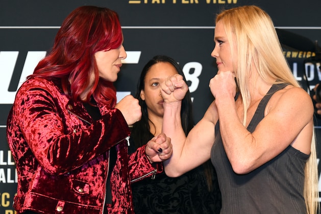 DETROIT, MI - NOVEMBER 30:  (L-R) Opponents Cris Cyborg of Brazil and Holly Holm face off ahead of their UFC 219 fight during the UFC 218 Ultimate Media Day at the DoubleTree Hotel on November 30, 2017 in Detroit, Michigan. (Photo by Josh Hedges/Zuffa LLC via Getty Images)