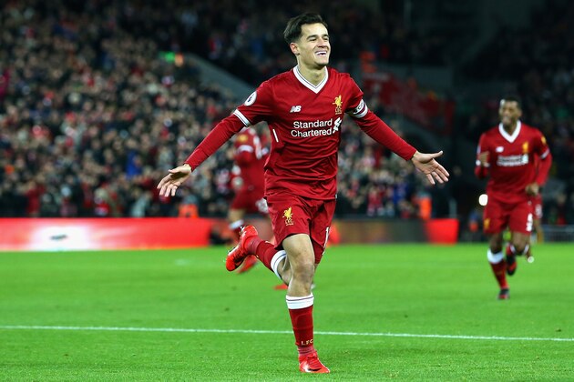 LIVERPOOL, ENGLAND - DECEMBER 26:  Philippe Coutinho of Liverpool scores his sides first goal during the Premier League match between Liverpool and Swansea City at Anfield on December 26, 2017 in Liverpool, England.  (Photo by Jan Kruger/Getty Images)