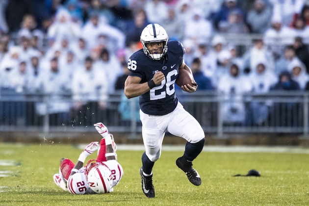 UNIVERSITY PARK, PA - NOVEMBER 18:  Saquon Barkley #26 of the Penn State Nittany Lions carries the ball on a touchdown run during the first quarter against the Nebraska Cornhuskers on November 18, 2017 at Beaver Stadium in University Park, Pennsylvania. Penn State defeats Nebraska 56-44.  (Photo by Brett Carlsen/Getty Images)