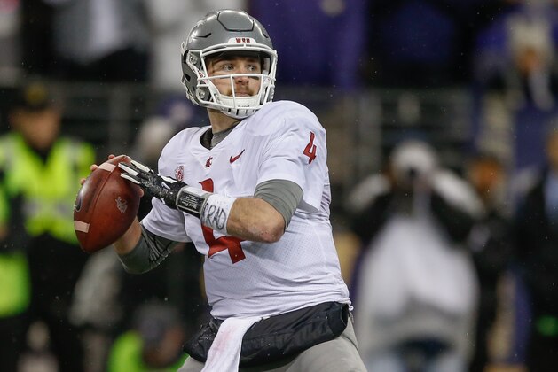 SEATTLE, WA - NOVEMBER 25:  Quarterback Luke Falk #4 of the Washington State Cougars passes against the Washington Huskies at Husky Stadium on November 25, 2017 in Seattle, Washington.  (Photo by Otto Greule Jr/Getty Images)