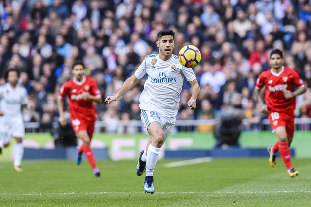 MADRID, SPAIN - DECEMBER 09: Marco Asensio of Real Madrid in action during the La Liga 2017-18 match between Real Madrid and Sevilla FC at Santiago Bernabeu Stadium on 09 December 2017 in Madrid, Spain. (Photo by Power Sport Images/Getty Images)