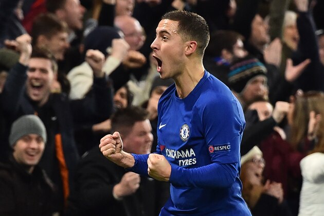 Chelsea's Belgian midfielder Eden Hazard celebrates an own goal by Atletico Madrid's Montenegrin defender Stefan Savic during a UEFA Champions League Group C football match between Chelsea and Atletico Madrid at Stamford Bridge in London on December 5, 2017. / AFP PHOTO / Glyn KIRK        (Photo credit should read GLYN KIRK/AFP/Getty Images)