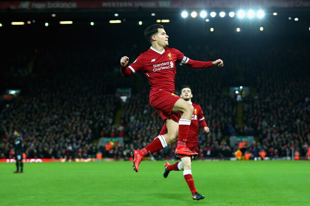 LIVERPOOL, ENGLAND - DECEMBER 26:  Philippe Coutinho of Liverpool scores his sides first goal during the Premier League match between Liverpool and Swansea City at Anfield on December 26, 2017 in Liverpool, England.  (Photo by Jan Kruger/Getty Images)