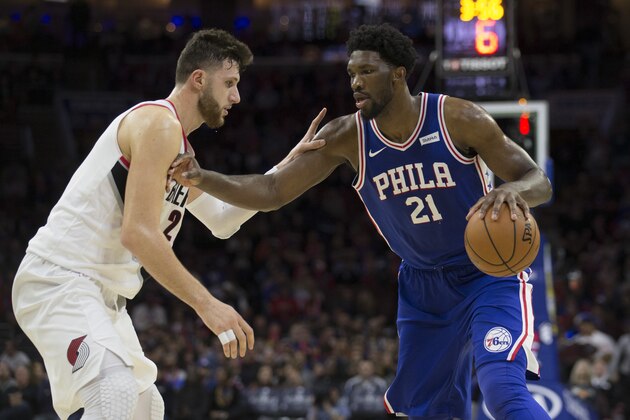 PHILADELPHIA, PA - NOVEMBER 22: Joel Embiid #21 of the Philadelphia 76ers drives to the basket against Jusuf Nurkic #27 of the Portland Trail Blazers in the fourth quarter at the Wells Fargo Center on November 22, 2017 in Philadelphia, Pennsylvania. The 76ers defeated the Trail Blazers 101-81. NOTE TO USER: User expressly acknowledges and agrees that, by downloading and or using this photograph, User is consenting to the terms and conditions of the Getty Images License Agreement. (Photo by Mitchell Leff/Getty Images)