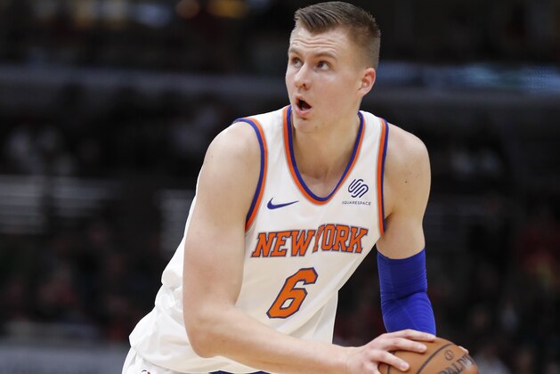 New York Knicks forward Kristaps Porzingis looks to shoot against the Chicago Bulls during the first half of an NBA basketball game, Saturday, Dec. 9, 2017, in Chicago. (AP Photo/Kamil Krzaczynski)