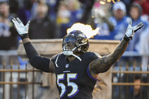 Baltimore Ravens outside linebacker Terrell Suggs (55) rallies the crowd as he runs onto the field before the first half of an NFL football game against Indianapolis Colts in Baltimore, Saturday, Dec 23, 2017. (AP Photo/Nick Wass)