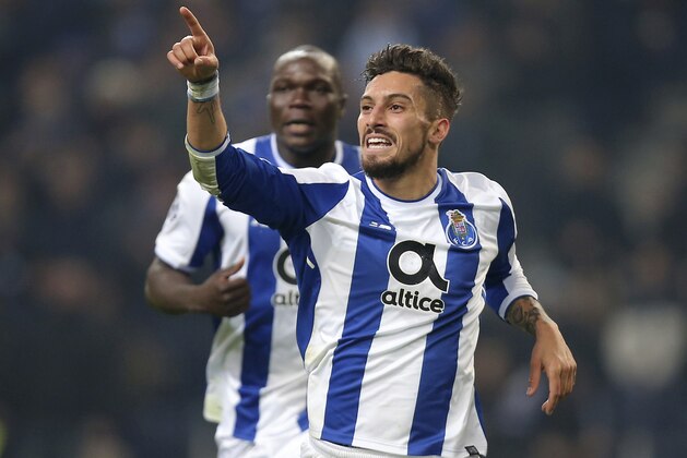 Porto's Alex Telles celebrates after scoring his side's fourth goal during the Champions League group G soccer match between FC Porto and AS Monaco at the Dragao stadium in Porto, Portugal, Wednesday, Dec. 6, 2017. (AP Photo/Luis Vieira)