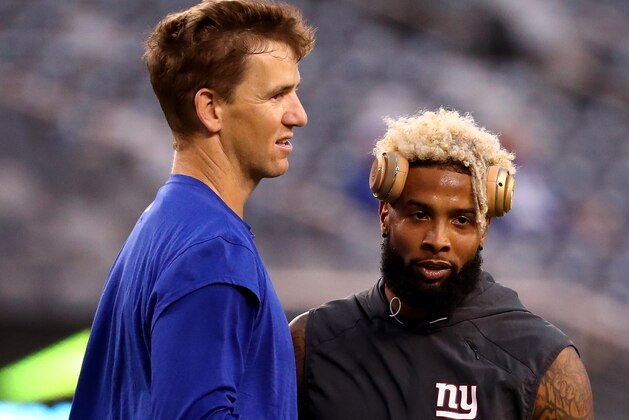EAST RUTHERFORD, NJ - SEPTEMBER 18:  (L-R) Eli Manning #10 of the New York Giants talks with his teammate Odell Beckham Jr. #13 prior to their game against the Detroit Lions at MetLife Stadium on September 18, 2017 in East Rutherford, New Jersey.  (Photo by Al Bello/Getty Images)