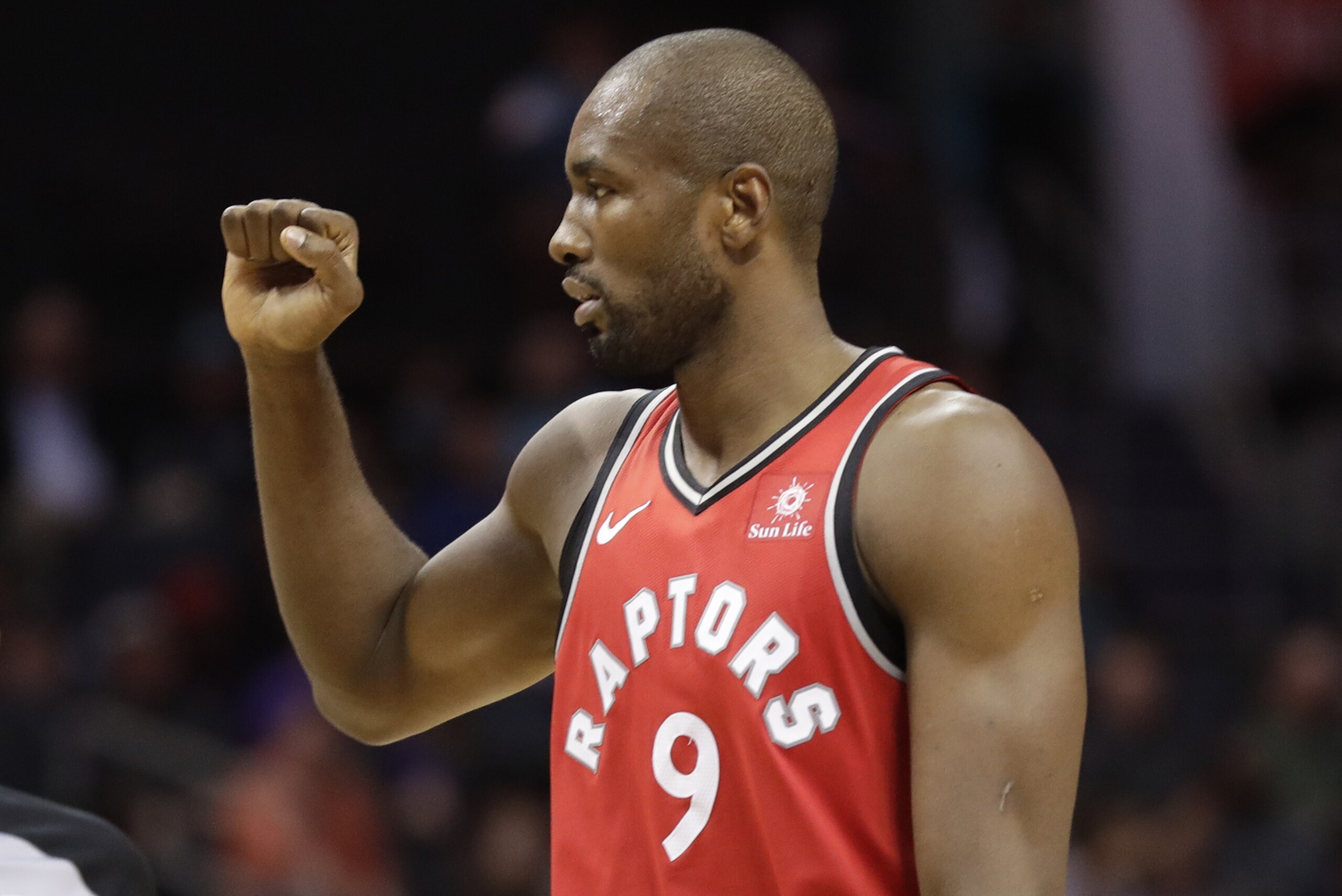 Toronto Raptors' Serge Ibaka (9) celebrates after a dunk against the Charlotte Hornets during the second half of an NBA basketball game in Charlotte, N.C., Wednesday, Dec. 20, 2017. (AP Photo/Chuck Burton)