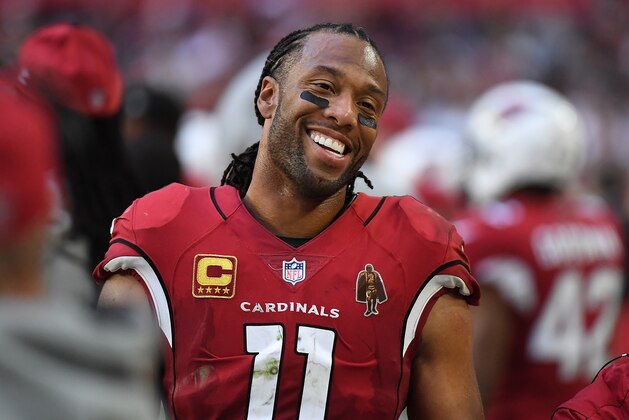 GLENDALE, AZ - DECEMBER 24:  Larry Fitzgerald #11 of the Arizona Cardinals reacts on the bench after catching a touchdown pass against the New York Giants at University of Phoenix Stadium on December 24, 2017 in Glendale, Arizona.  (Photo by Norm Hall/Getty Images)
