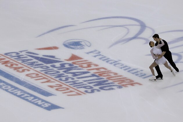 Cali Fujimoto and Nicholas Barsi-Rhyne perform in the championship pairs short program during the U.S. Figure Skating Championships Thursday, Jan. 19, 2017, in Kansas City, Mo. (AP Photo/Charlie Riedel)