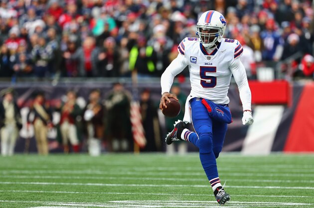 FOXBORO, MA - DECEMBER 24:  Tyrod Taylor #5 of the Buffalo Bills runs with the ball during the first quarter of a game against the New England Patriots at Gillette Stadium on December 24, 2017 in Foxboro, Massachusetts.  (Photo by Tim Bradbury/Getty Images)