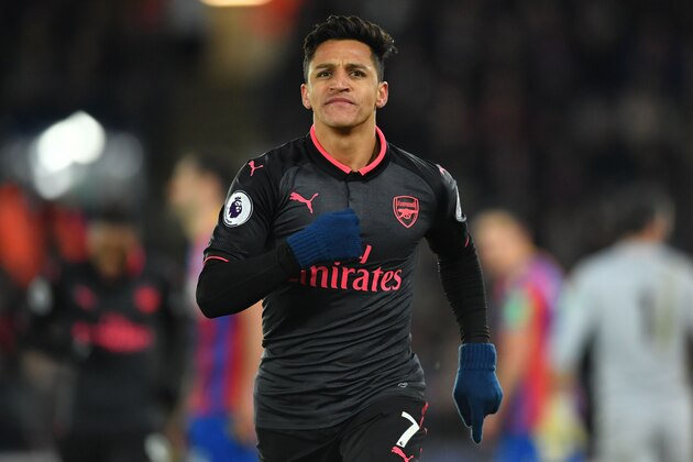 Arsenal's Chilean striker Alexis Sanchez celebrates after scoring their third goal during the English Premier League football match between Crystal Palace and Arsenal at Selhurst Park in south London on December 28, 2017. / AFP PHOTO / Ben STANSALL / RESTRICTED TO EDITORIAL USE. No use with unauthorized audio, video, data, fixture lists, club/league logos or 'live' services. Online in-match use limited to 75 images, no video emulation. No use in betting, games or single club/league/player publications.  /         (Photo credit should read BEN STANSALL/AFP/Getty Images)