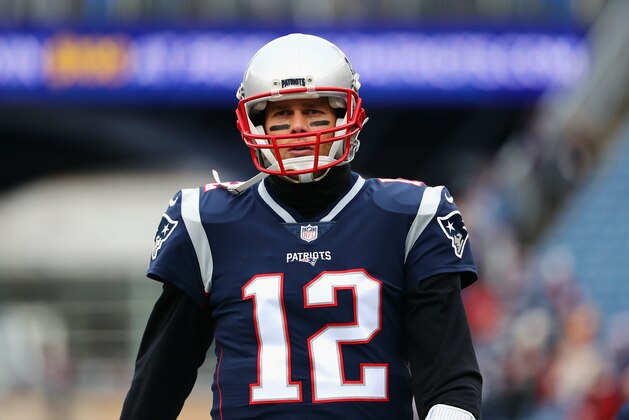 FOXBORO, MA - DECEMBER 24:  Tom Brady #12 of the New England Patriots walks onto the field before the game against the Buffalo Bills at Gillette Stadium on December 24, 2017 in Foxboro, Massachusetts.  (Photo by Tim Bradbury/Getty Images)