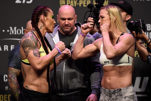 LAS VEGAS, NV - DECEMBER 29:  (L-R) Cris Cyborg of Brazil and Holly Holm face off during the UFC 219 weigh-in inside T-Mobile Arena on December 29, 2017 in Las Vegas, Nevada. (Photo by Jeff Bottari/Zuffa LLC/Zuffa LLC via Getty Images)