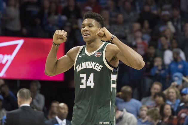 Milwaukee Bucks forward Giannis Antetokounmpo (34) celebrates after the NBA basketball game against the Oklahoma City Thunder in Oklahoma City, Friday, Dec.29, 2017. The Bucks defeated the Thunder 97-95. (AP Photo/J Pat Carter)