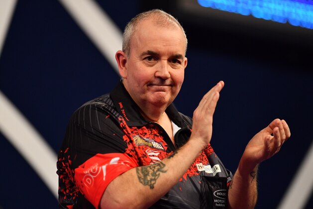 LONDON, ENGLAND - DECEMBER 30: Phil Taylor celebrates after winning his Semi Final Match against Jamie Lewis during the 2018 William Hill PDC World Darts Championships at Alexandra Palace on December 30, 2017 in London, England. (Photo by Justin Setterfield/Getty Images)