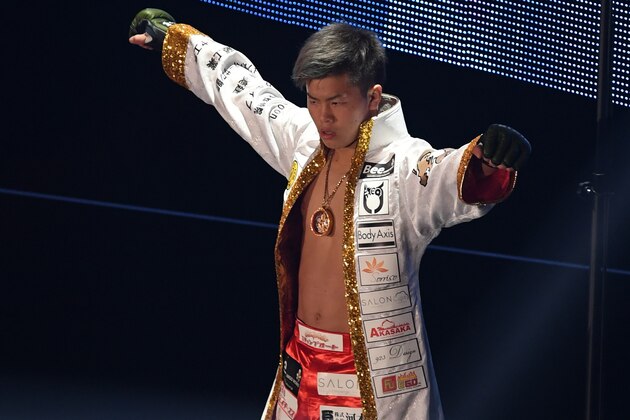 SAITAMA, JAPAN - DECEMBER 29:  Tenshin Nasukawa of Japan enters the ring in the bout against Nikita Sapun of Ukraine during the RIZIN Fighting World GP 2016 second round at Saitama Super Arena on December 29, 2016 in Saitama, Japan.  (Photo by Etsuo Hara/Getty Images)