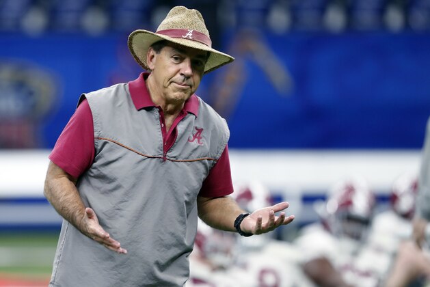 Alabama head coach Nick Saban talks to players during practice for the upcoming Sugar Bowl semi-final playoff game against Clemson, for the NCAA college football national championship, in New Orleans, Saturday, Dec. 30, 2017. (AP Photo/Gerald Herbert)