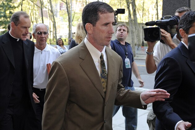 Former NBA referee Tim Donaghy arrives at Brooklyn federal court for his sentencing, Tuesday, July 29, 2008, in New York. Donaghy pleaded guilty in August 2007 to federal charges that he took payoffs from a professional gambler for inside tips on games. (AP Photo/ Louis Lanzano)