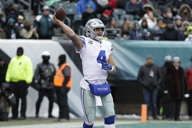 Dallas Cowboys' Dak Prescott in action during the first half of an NFL football game against the Philadelphia Eagles, Sunday, Dec. 31, 2017, in Philadelphia. (AP Photo/Chris Szagola)